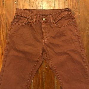 Men’s levis jeans size 32 x 34 brick colored